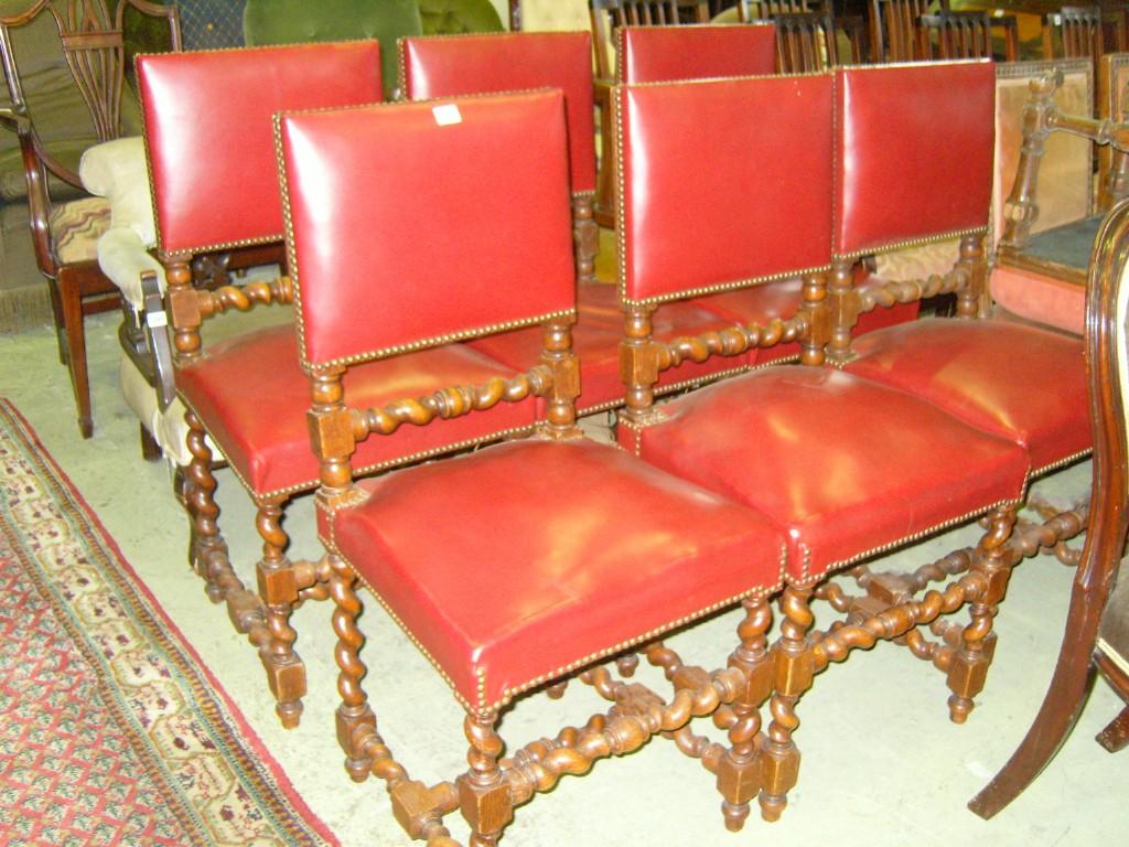 Appraisal: A set of six oak dining chairs with upholstered seats