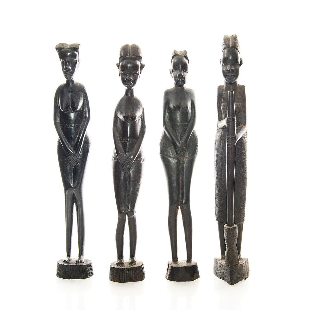 Appraisal: HAND CARVED AFRICAN FEMALE FIGURAL SCULPTURES posing with hands over