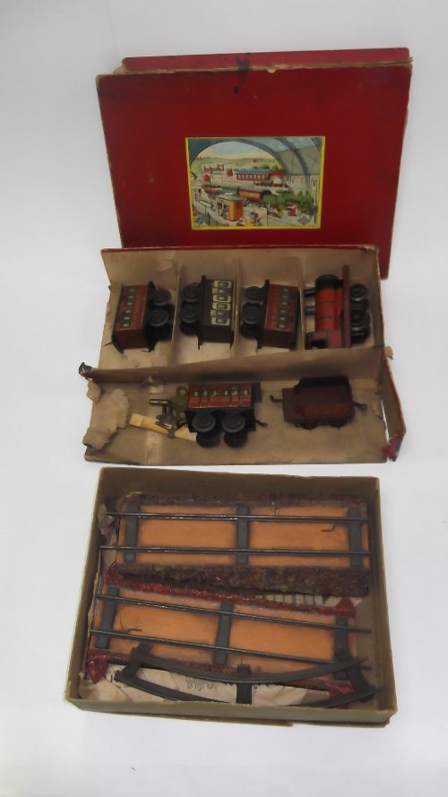 Appraisal: A clockwork tinplate trainset by Gebr der Bing in original