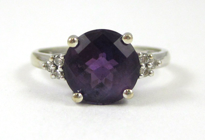 Appraisal: AMETHYST DIAMOND AND FOURTEEN KARAT GOLD RING The white gold