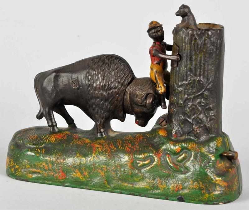 Appraisal: Cast Iron Butting Buffalo Mechanical Bank Description Manufactured by Kyser