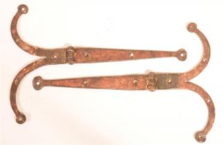 Appraisal: Pair of th Century Ram's Horn Strap Hinges With penny