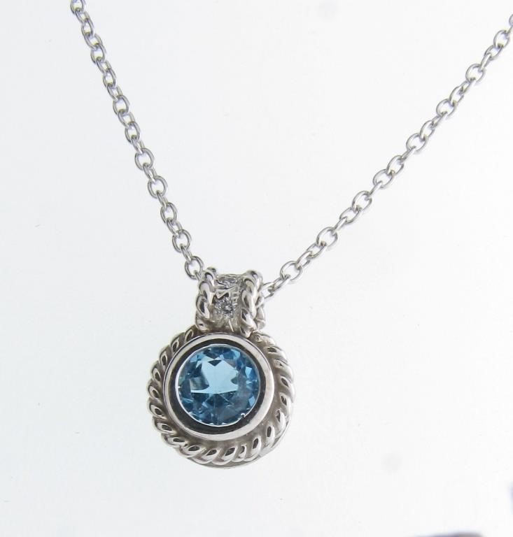 Appraisal: A K white gold pendant containing an approximately mm round