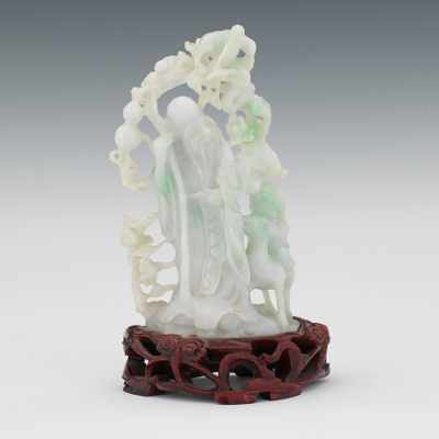 Appraisal: Carved Jadeite Scholar with Small Child Riding a Sheep Figure