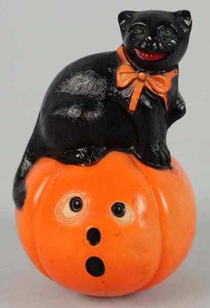 Appraisal: Celluloid Halloween Cat on Top of Pumpkin Condition Excellent Size