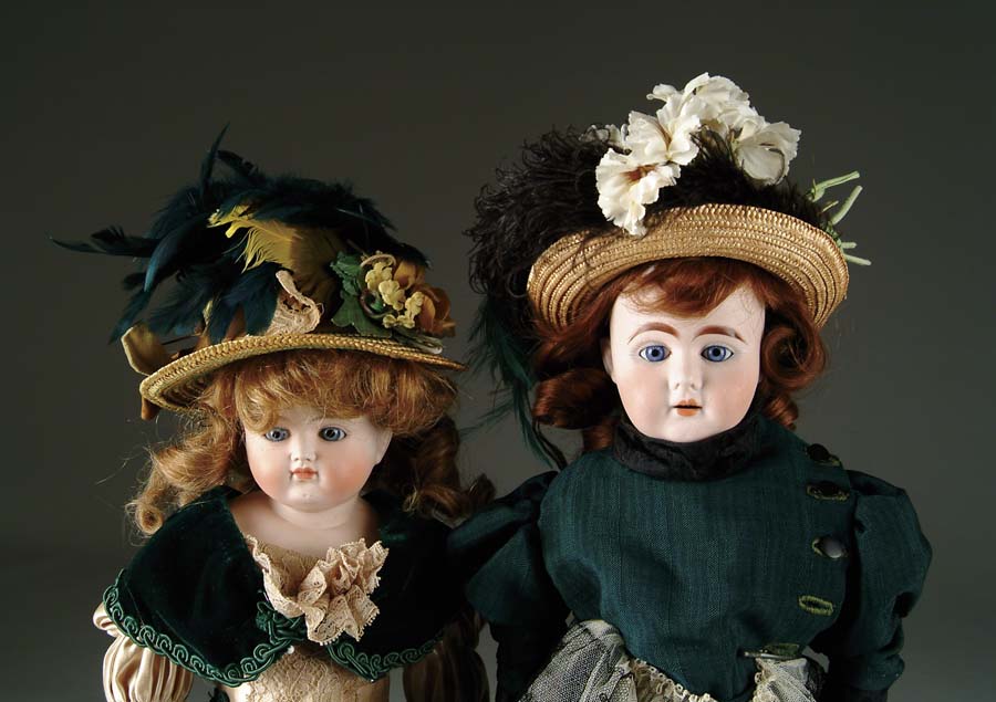 Appraisal: LOT OF TWO GERMAN BISQUE SHOULDER HEAD DOLLS glass eye