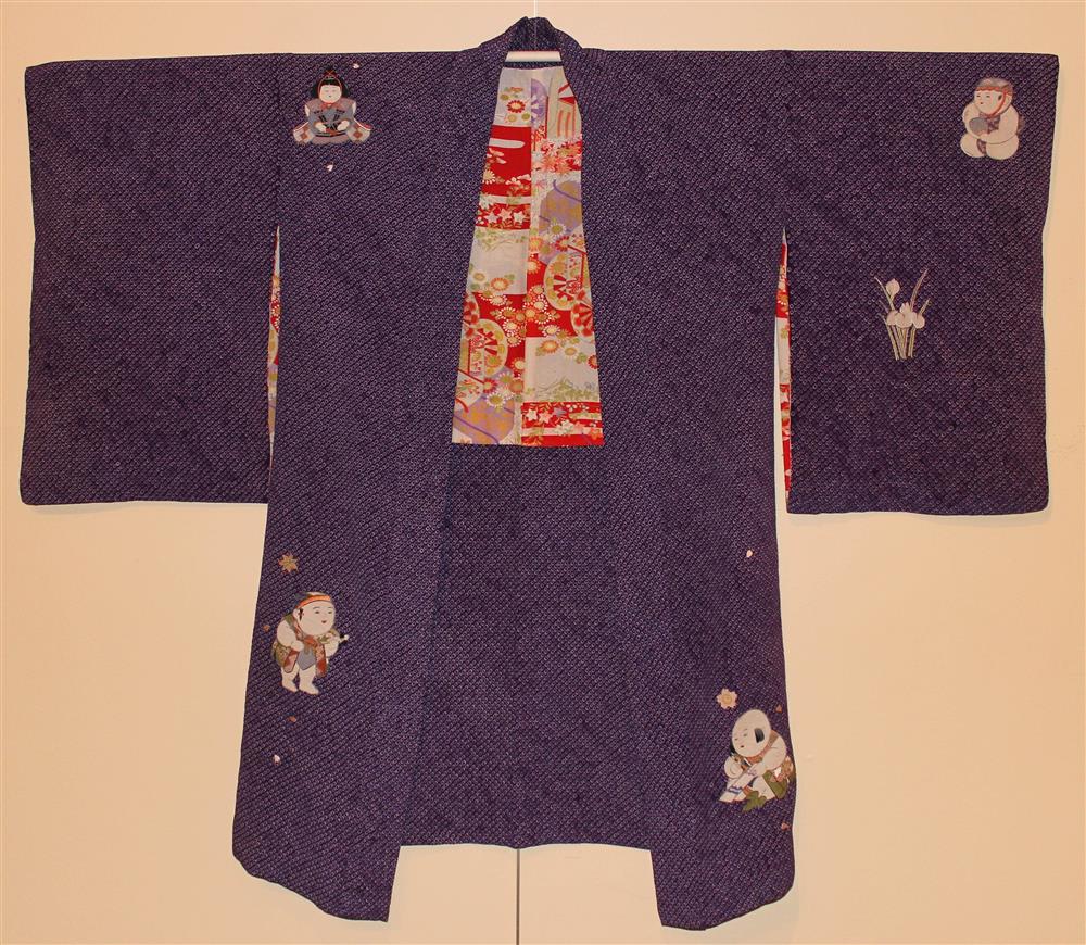 Appraisal: THREE JAPANESE YOUNG GIRLS' ROBES including a purple chirimen crepe