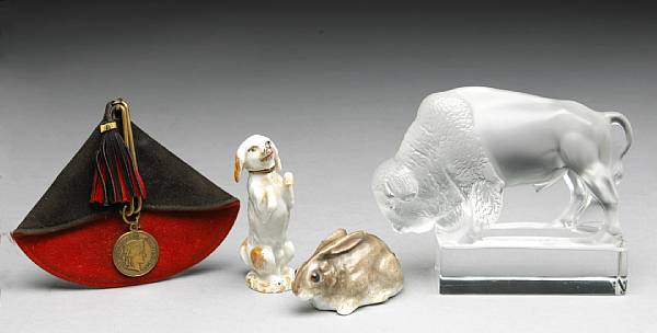 Appraisal: A Lalique glass figure of a bison and two Continental