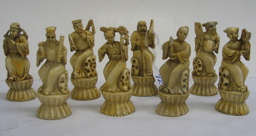 Appraisal: A SET OF EIGHT CARVED IVORY FIGURES The Eight Chinese