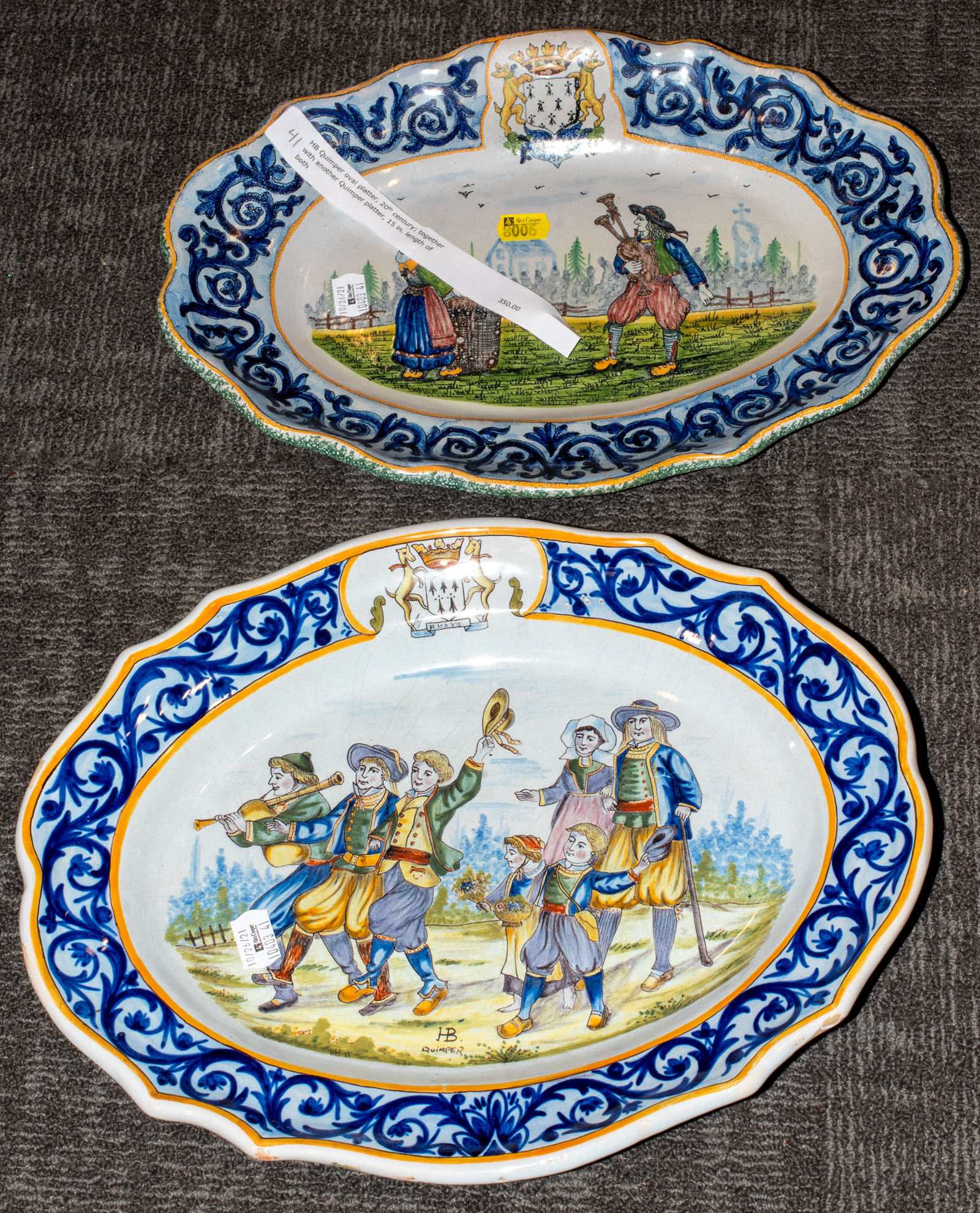 Appraisal: TWO QUIMPER HAND-PAINTED OVAL PLATTERS st half th century One