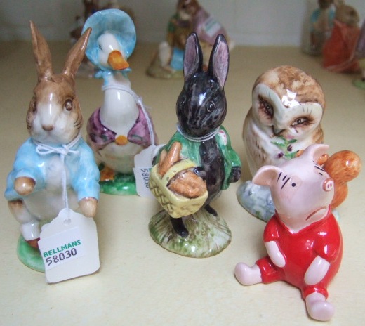 Appraisal: Four Beatrix Potter figures brown back stamp Little Black Rabbit