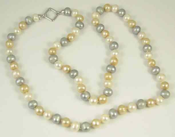 Appraisal: MULTI-COLOR PEARL NECKLACE strung with white golden and grey pearls