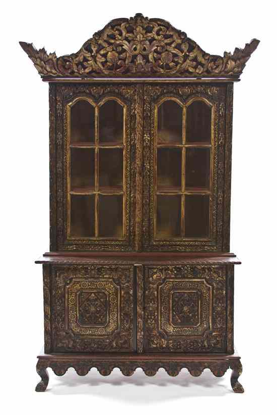 Appraisal: A Southeast Asian Lacquered and Parcel Gilt Cabinet the domed