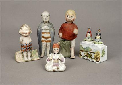 Appraisal: Four Polychrome Biscuit Porcelain Bobbing-Head Figures Together with a polychrome