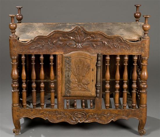 Appraisal: French provincial carved walnut panetiere Late th early th century