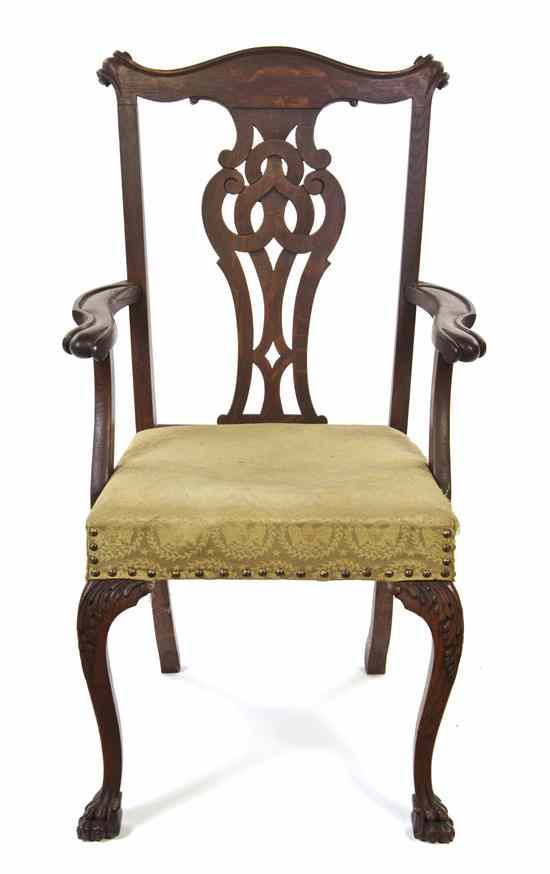 Appraisal: An American Chippendale Style Armchair having a serpentine crest over