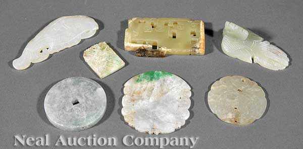 Appraisal: A Group of Seven Antique Chinese Archaistic Carved Jade Pendants