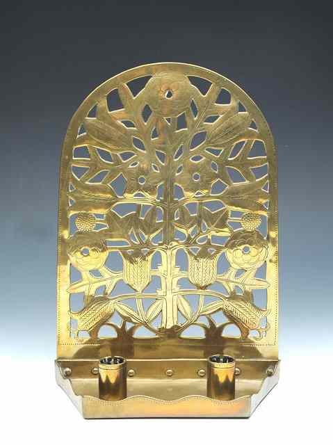 Appraisal: Ernest Gimson British - A brass wall sconce executed by