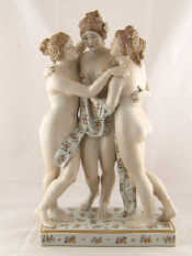 Appraisal: A ceramic group of the Three Graces the plinth and