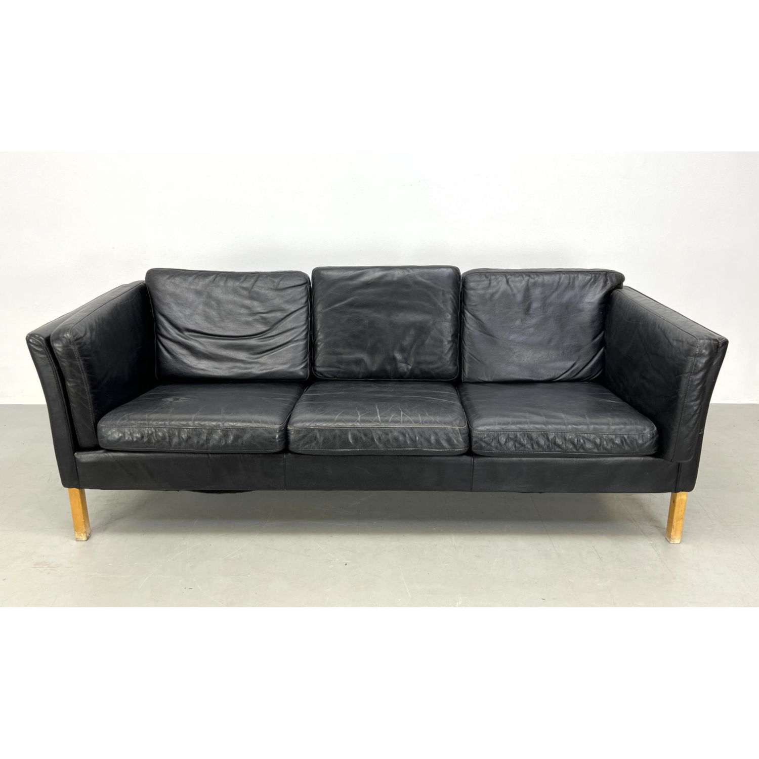 Appraisal: Modernist Black Leather Sofa Couch Wood Legs Dimensions H inches