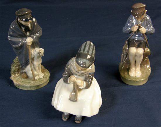 Appraisal: Three Royal Copenhagen figures lady knitting boy with dog seated