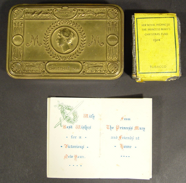 Appraisal: World War I military brass Mary tin containing Christmas card