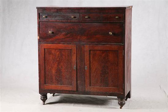 Appraisal: SERVER Mahogany Empire with three drawers and a blind door