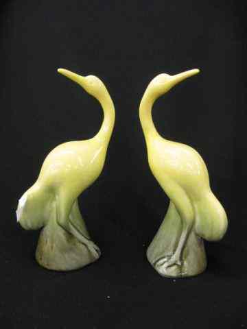 Appraisal: Pair of Rookwood Pottery Figurines of Cranes yellow shape ''