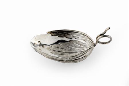 Appraisal: A George III leaf caddy spoon J W part Birmingham