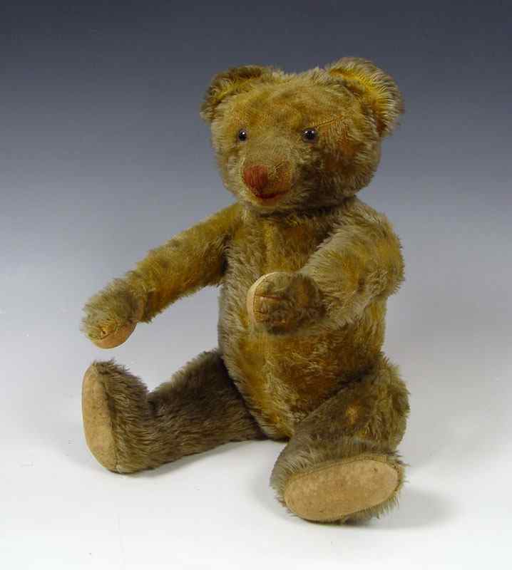 Appraisal: EARLY MUSICAL TEDDY BEAR The music is of the stop