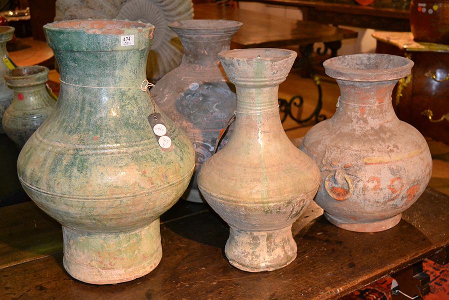 Appraisal: FOUR CHINESE GLAZED EARTHENWARE JARS HAN DYNASTY of waisted and