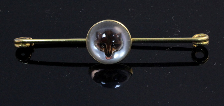 Appraisal: A carved intaglio fox mask bar brooch of circular form