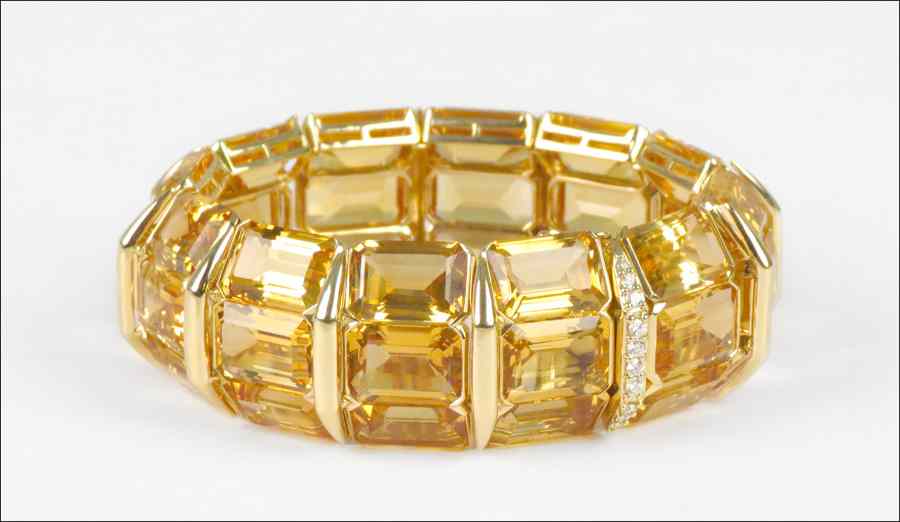 Appraisal: CITRINE DIAMOND AND KARAT YELLOW GOLD BRACELET Comprised of emerald