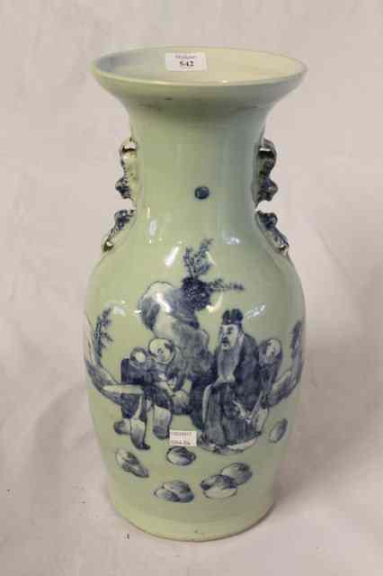 Appraisal: A CHINESE CELADON BALUSTER VASE decorated scholars and rock work