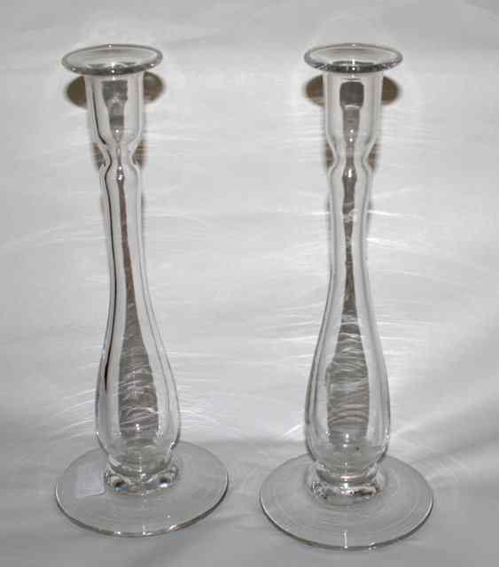 Appraisal: A PAIR OF TH CENTURY STYLE GLASS CANDLESTICKS with hollow