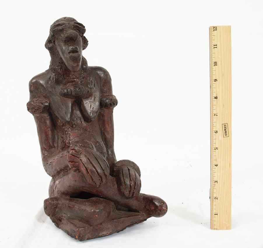 Appraisal: CARVED AFRICAN STONE POTTERY FIGURINE '' x '' x ''