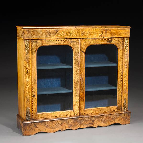 Appraisal: A Victorian gilt bronze mounted marquetry and walnut bookcase last