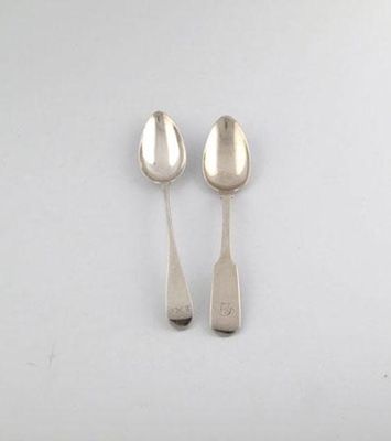 Appraisal: John Ewen a silver Old English pattern dessert spoon circa