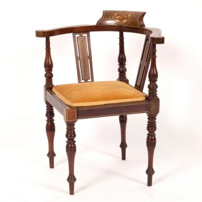 Appraisal: A child's Edwardian mahogany corner chair with drop in seat