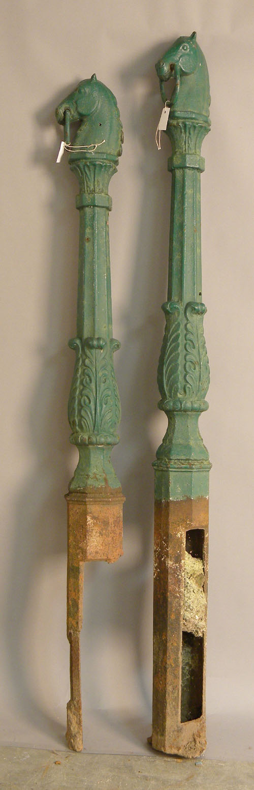 Appraisal: Pair of cast iron horse head hitching posts th c