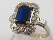 Appraisal: A white metal tests carat gold sapphire and diamond ring