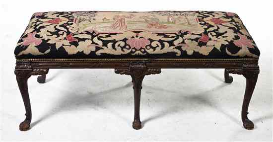 Appraisal: A Chippendale Style Bench having a needlepoint upholstered seat raised