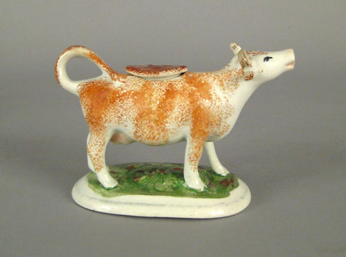 Appraisal: Staffordshire cow creamer th c with brown spatter body h