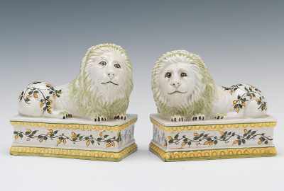 Appraisal: A Pair of Italian Majolica Lion Ornaments Clear glazed pottery