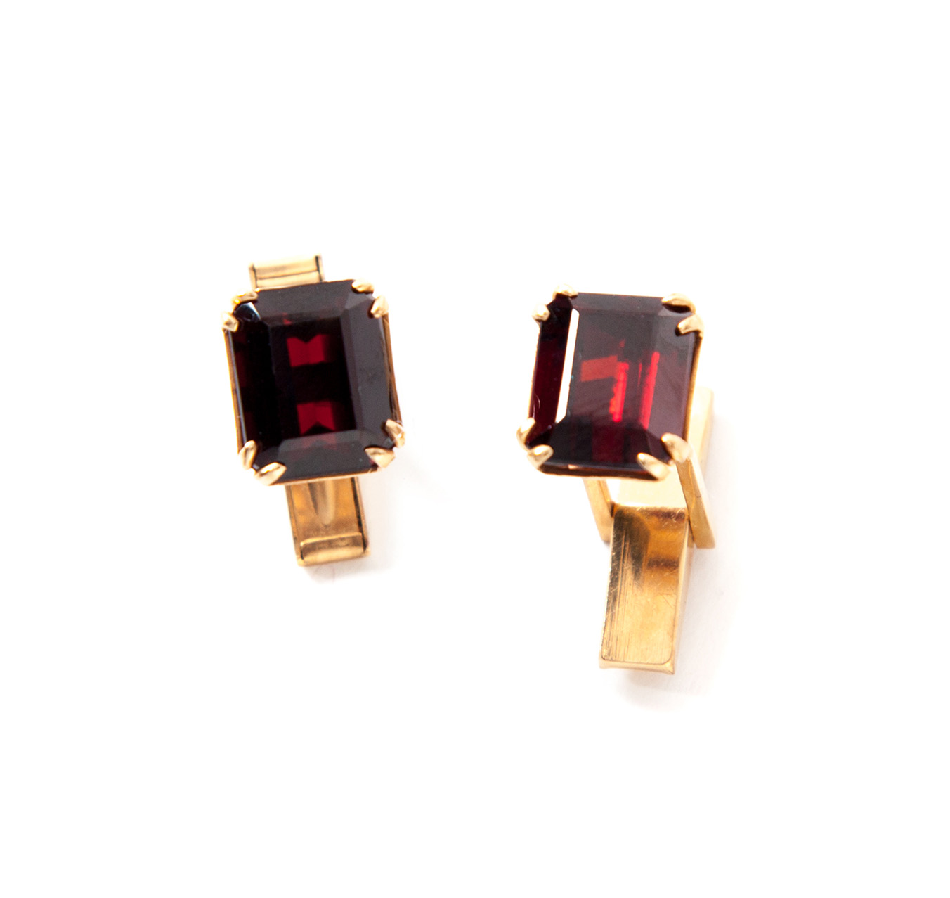 Appraisal: PAIR OF GOLD AND GARNET CUFFLINKS American mid th century