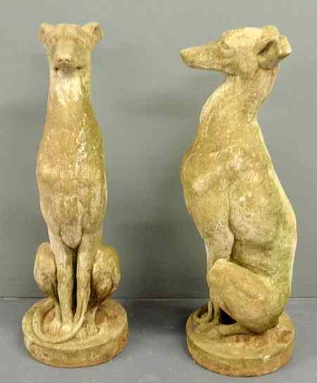 Appraisal: Pair of cast stone seated whippet garden statues h base