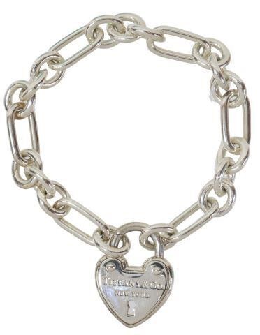 Appraisal: Tiffany Company sterling silver heart arc padlock bracelet having oval