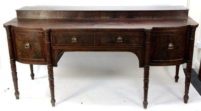 Appraisal: A Regency mahogany sideboard the superstructure fitted a drawer to