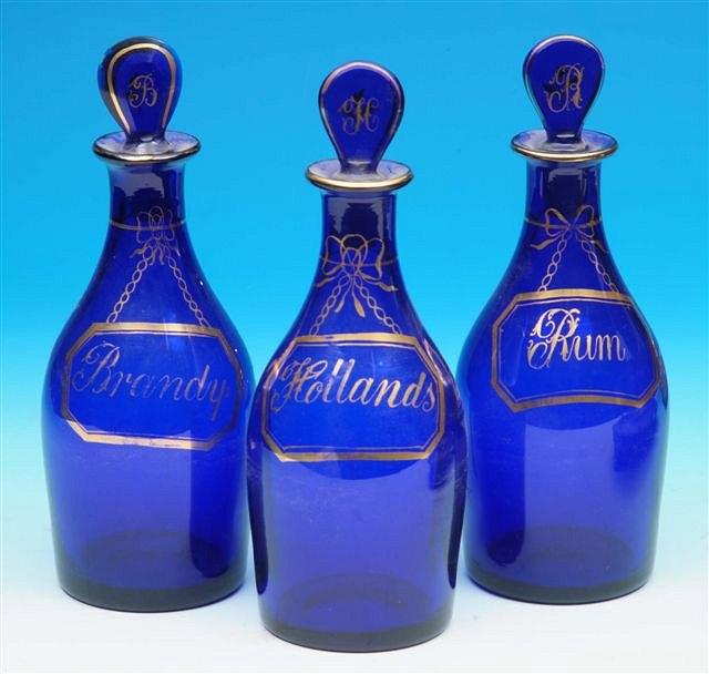 Appraisal: A matched set of three th Century Bristol blue spirit