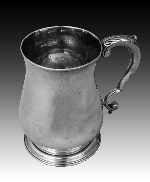 Appraisal: A GEORGE II SILVER HALF PINT SIZE BALUSTER SHAPED TANKARD